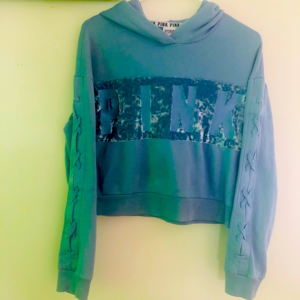 hooded blue velvet sweater.